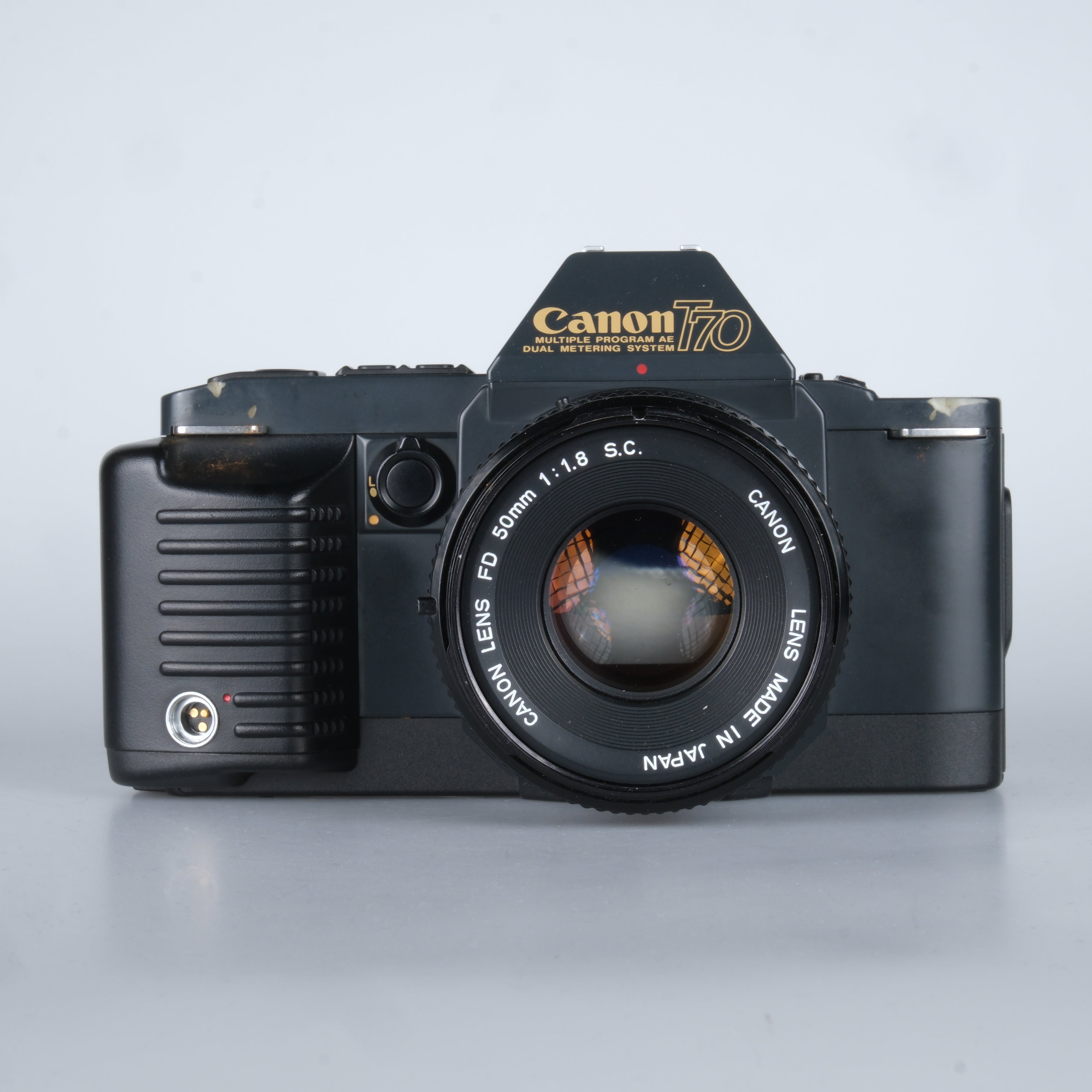 Canon T70 – click & surr