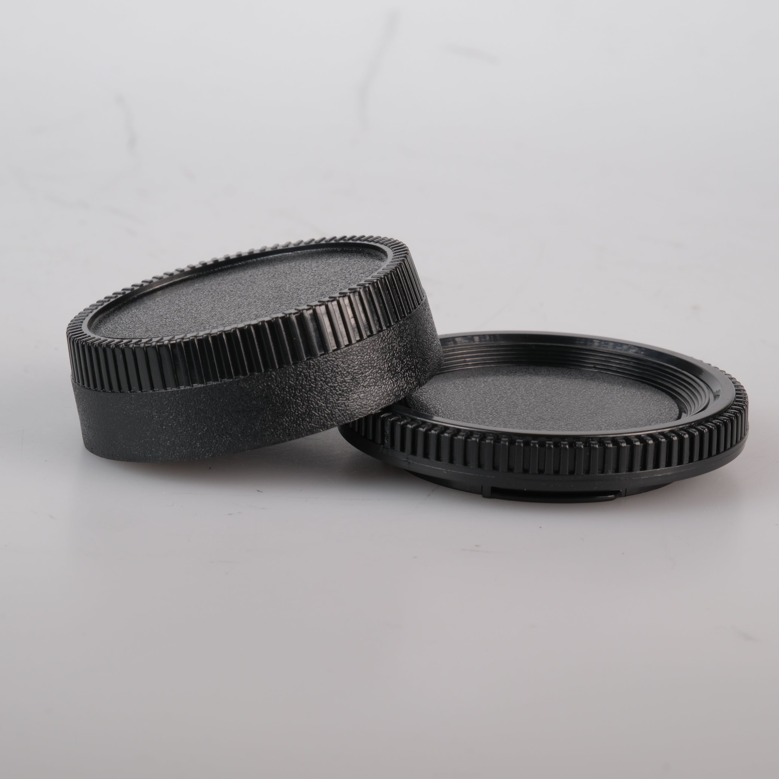 Nikon Objektiv - und Gehäusedeckel