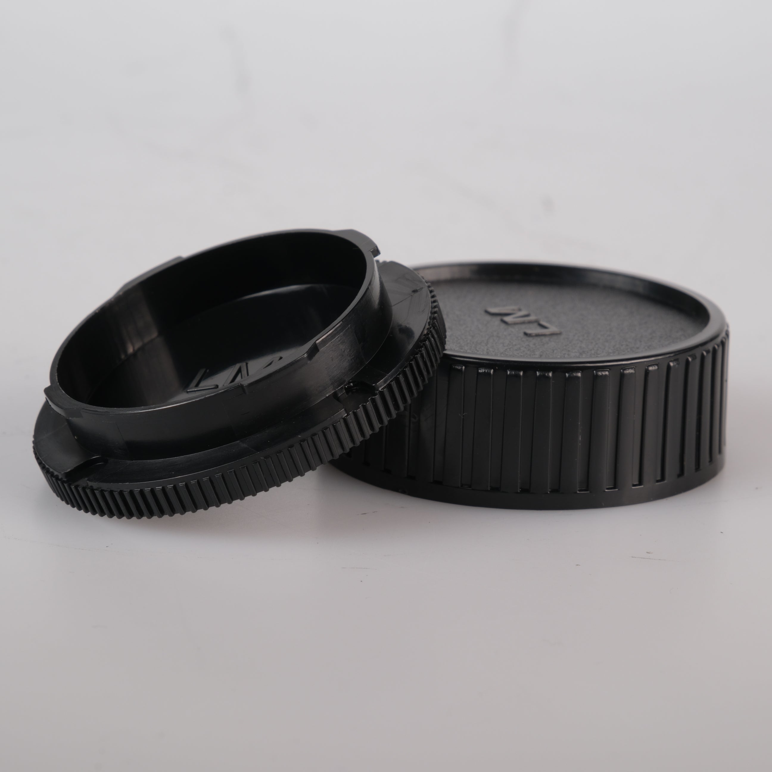 Leica Objektiv - und Gehäusedeckel