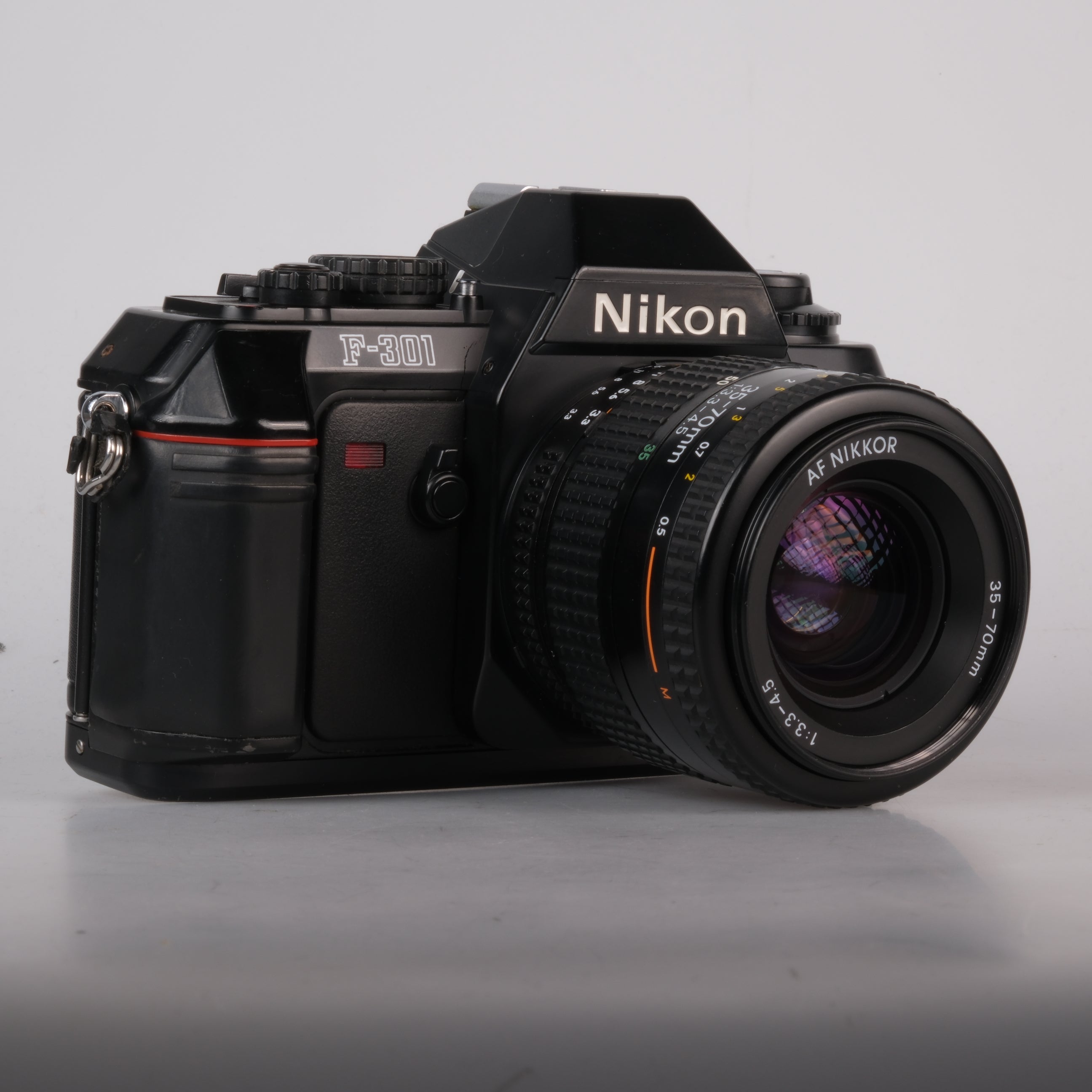 Nikon F-301 + AF Nikkor 3.3-4.5/35-70mm