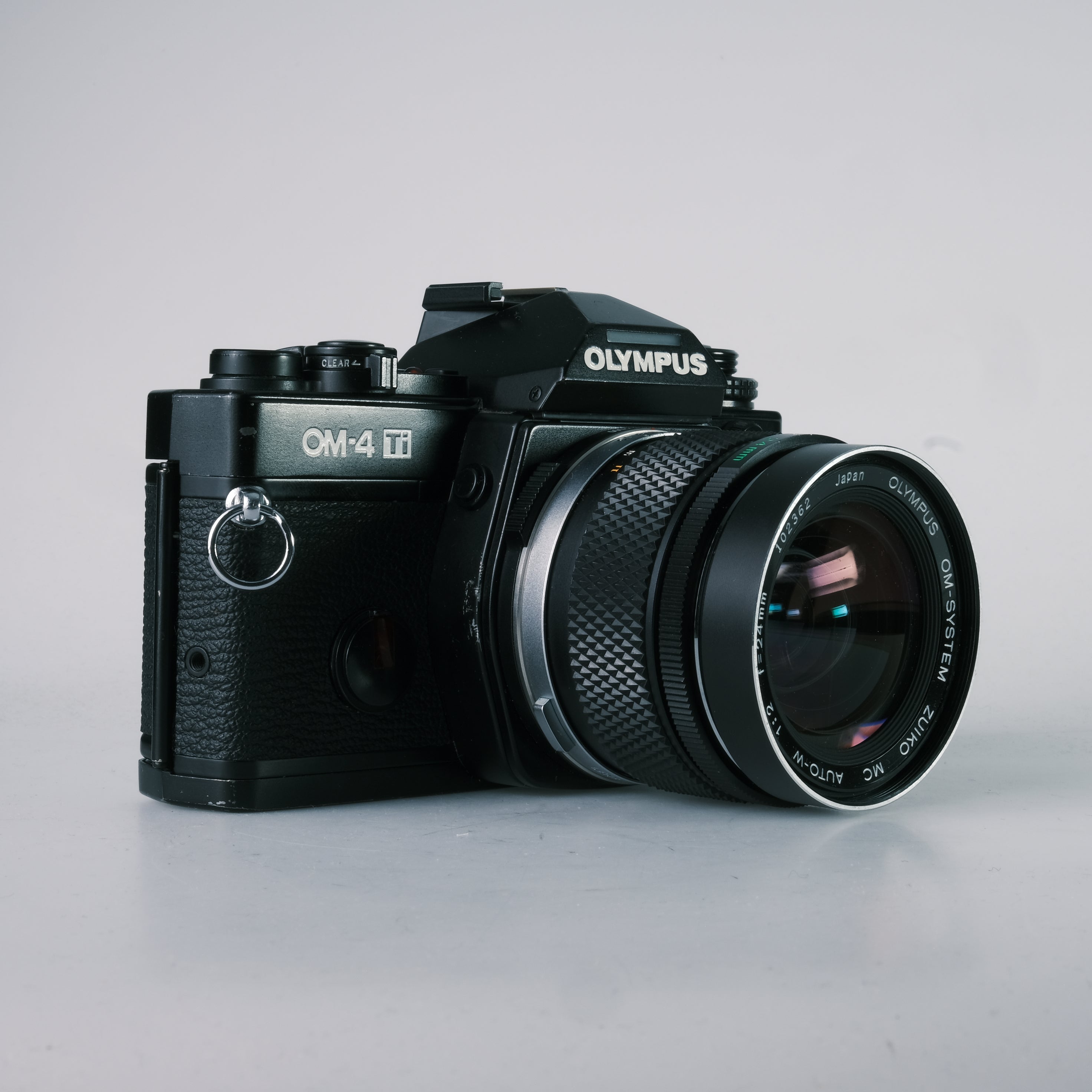 Olympus OM-4 Ti – Click & Surr