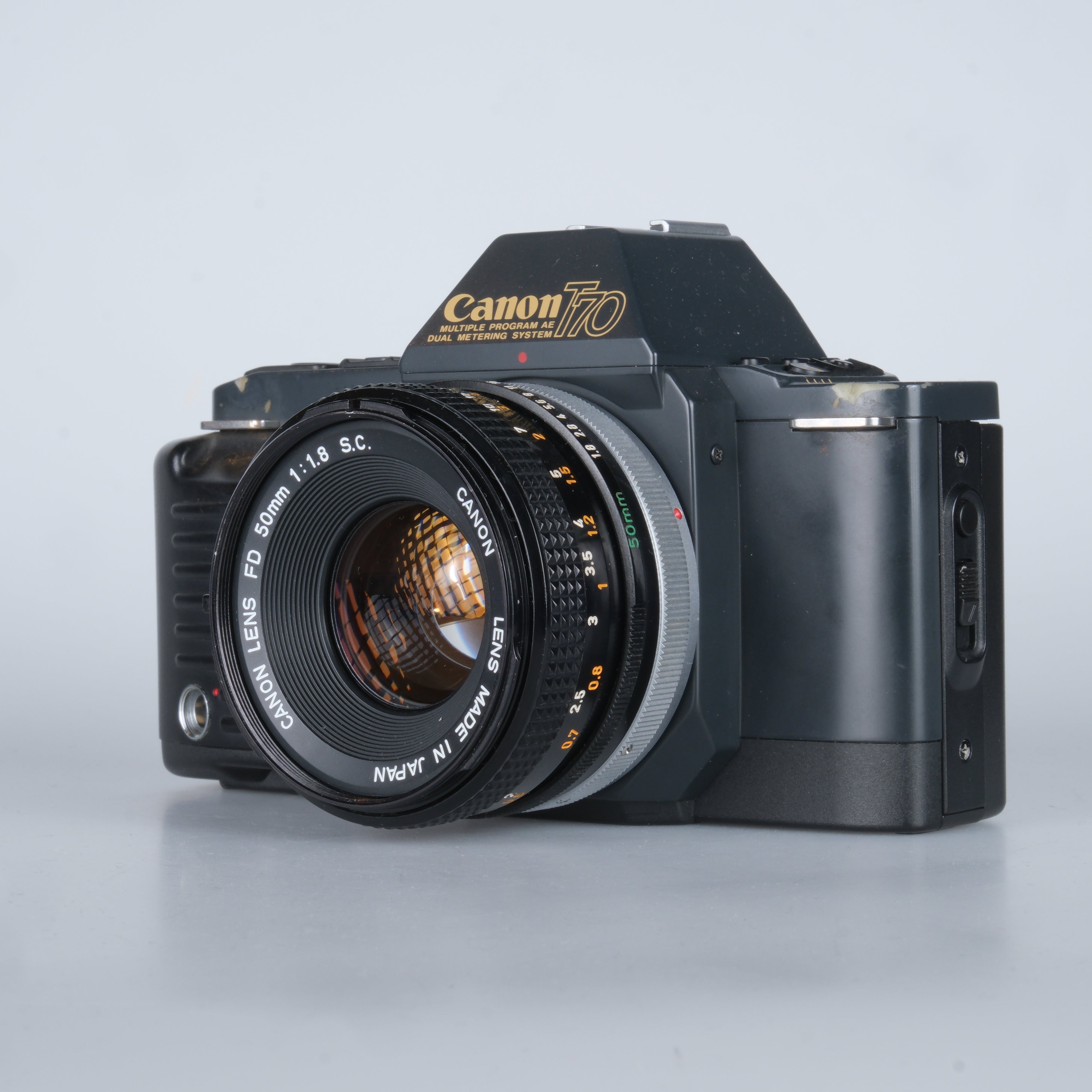 Canon T70 – click & surr