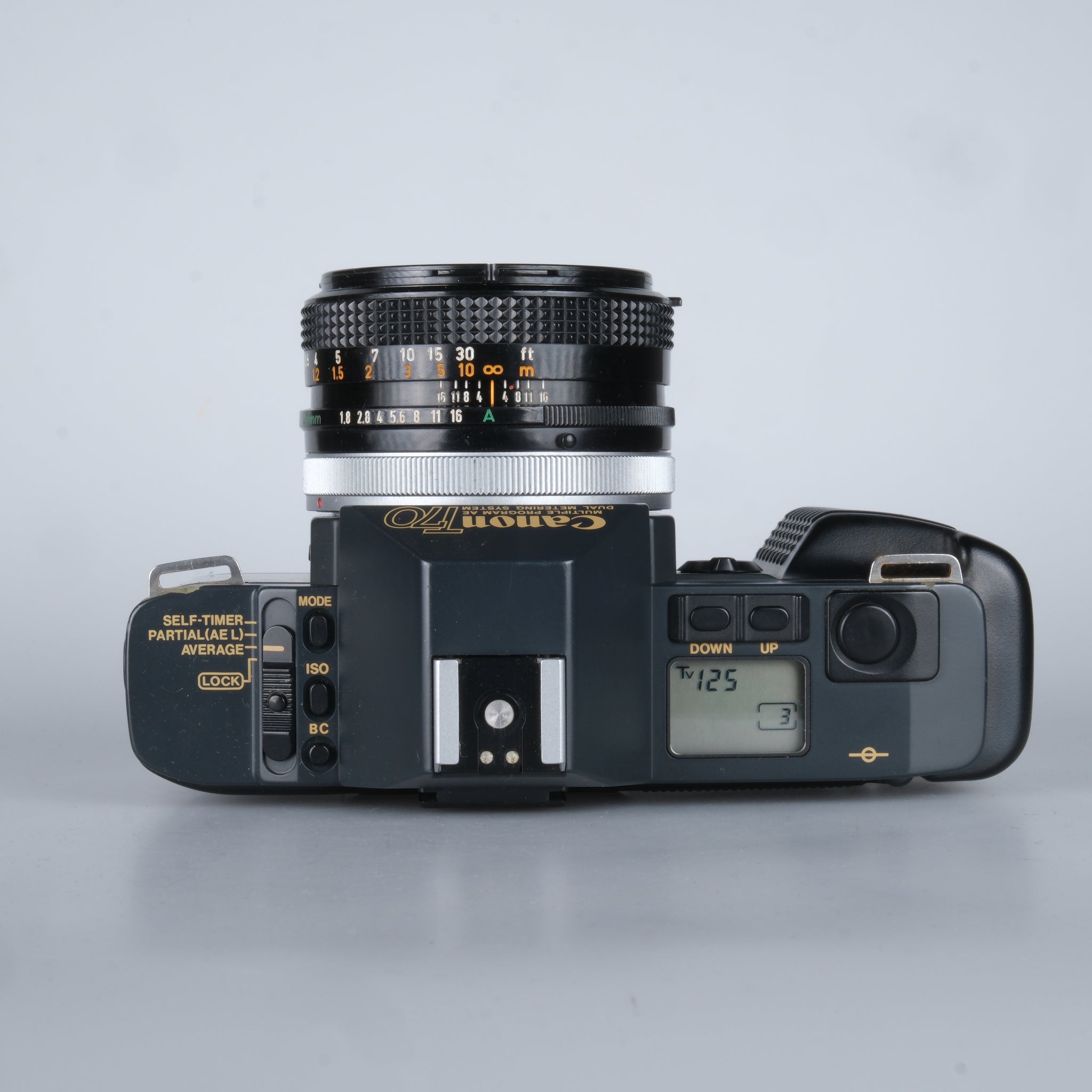 Canon T70 – click & surr